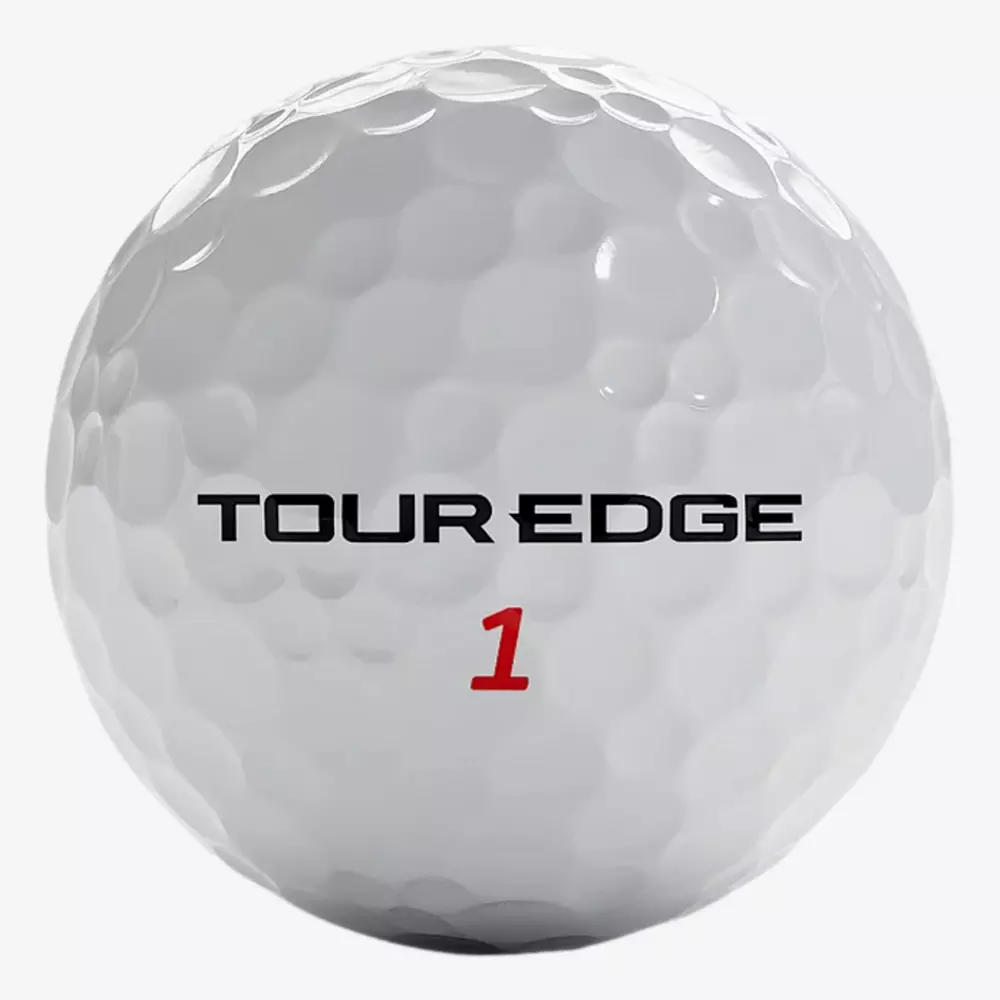 A white golf ball with TOUR EDGE printed in black letters and the number 1 in red below the text. The standard dimpled surface mirrors those found on top courses, where players also search for the best golf shoes 2026 has to offer. Shown on a plain white background.