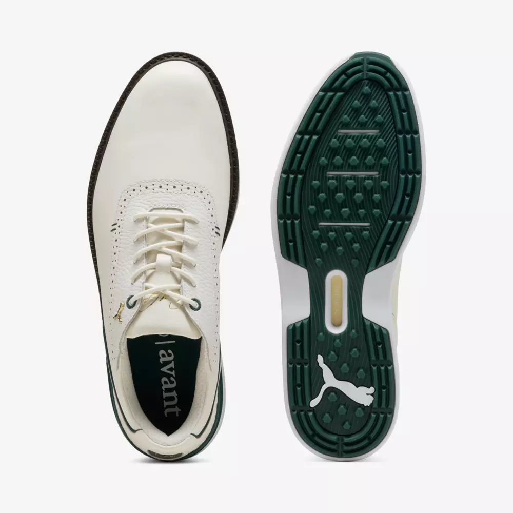 A pair of white golf shoes with green soles, shown from the top and bottom views. The sole features a Puma logo and textured grip, while the top shows laces and perforated detailing&mdash;an alternative to the best Jordan golf shoes.