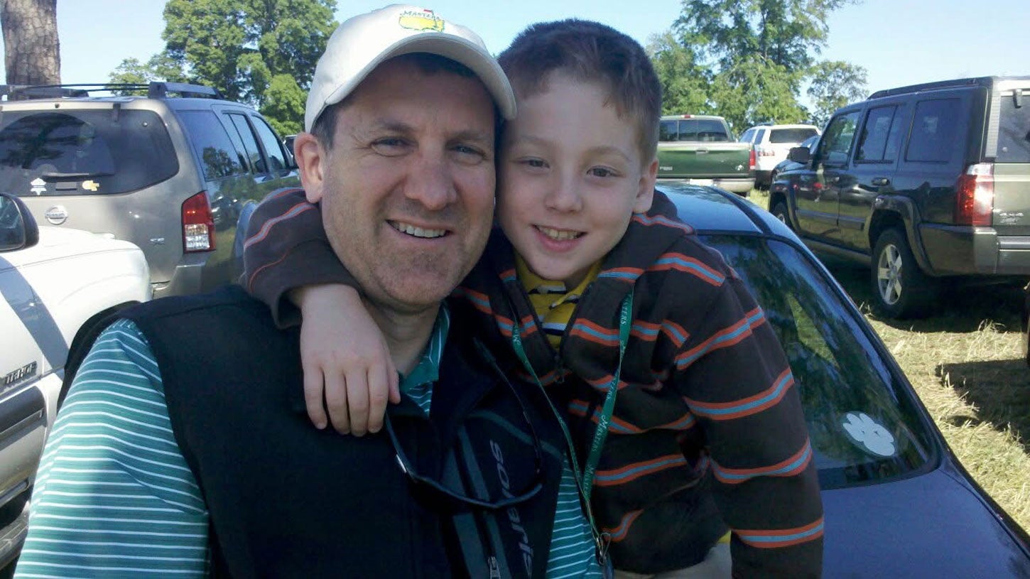Jake Patterson and his father at the 2011 Masters.