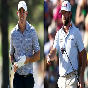 Two male golfers on a course, each wearing collared shirts and hats&mdash;one on the left smiling with a golf glove, the other holding a putter, both focused during a tournament, leaving viewers to wonder who will win the Masters.