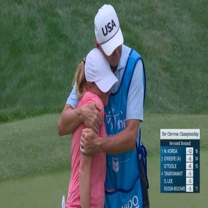 Stacy Lewis and her father on the final hole at the Chevron Championship.