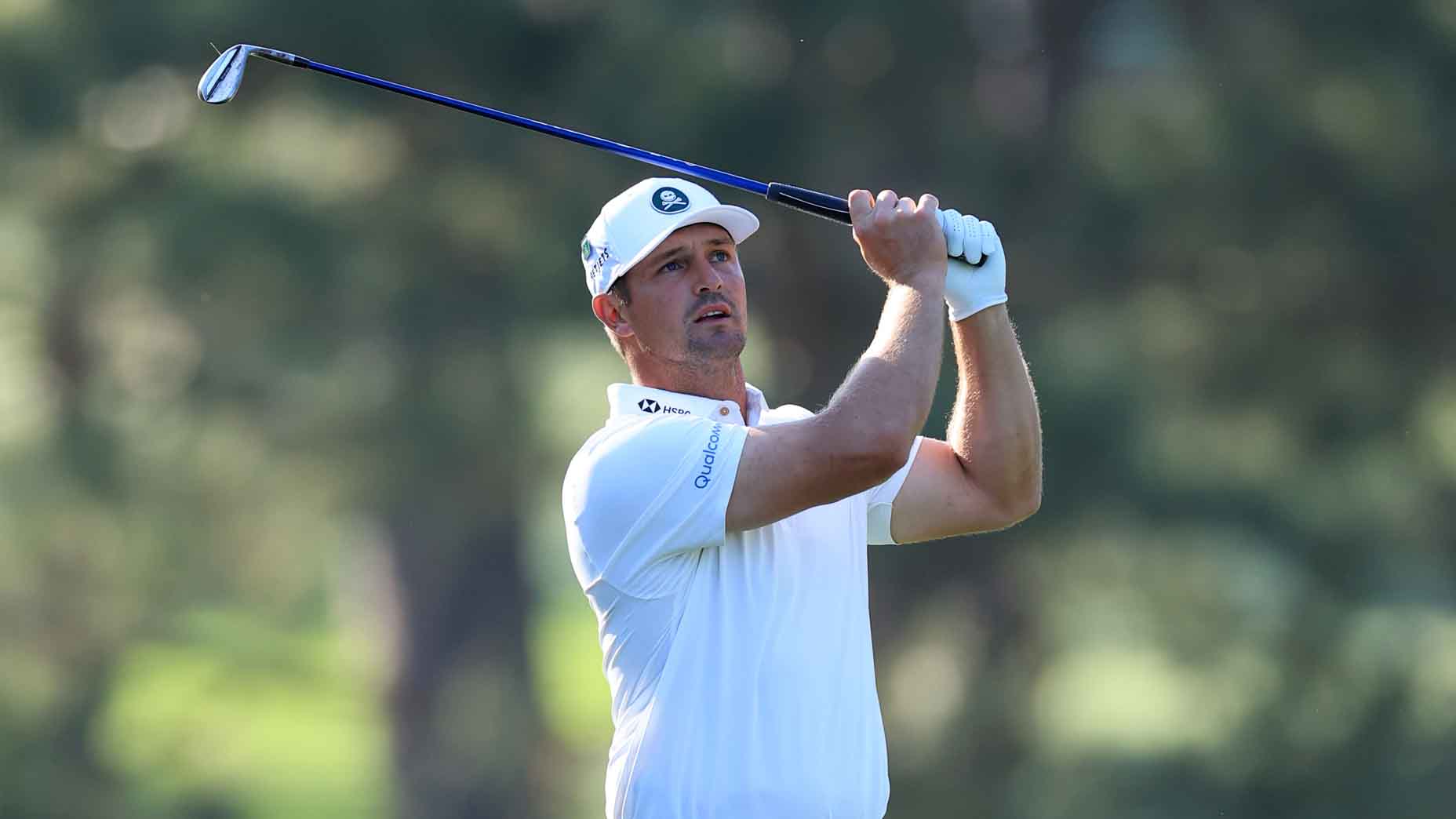 Bryson DeChambeau hits a shot at the Masters