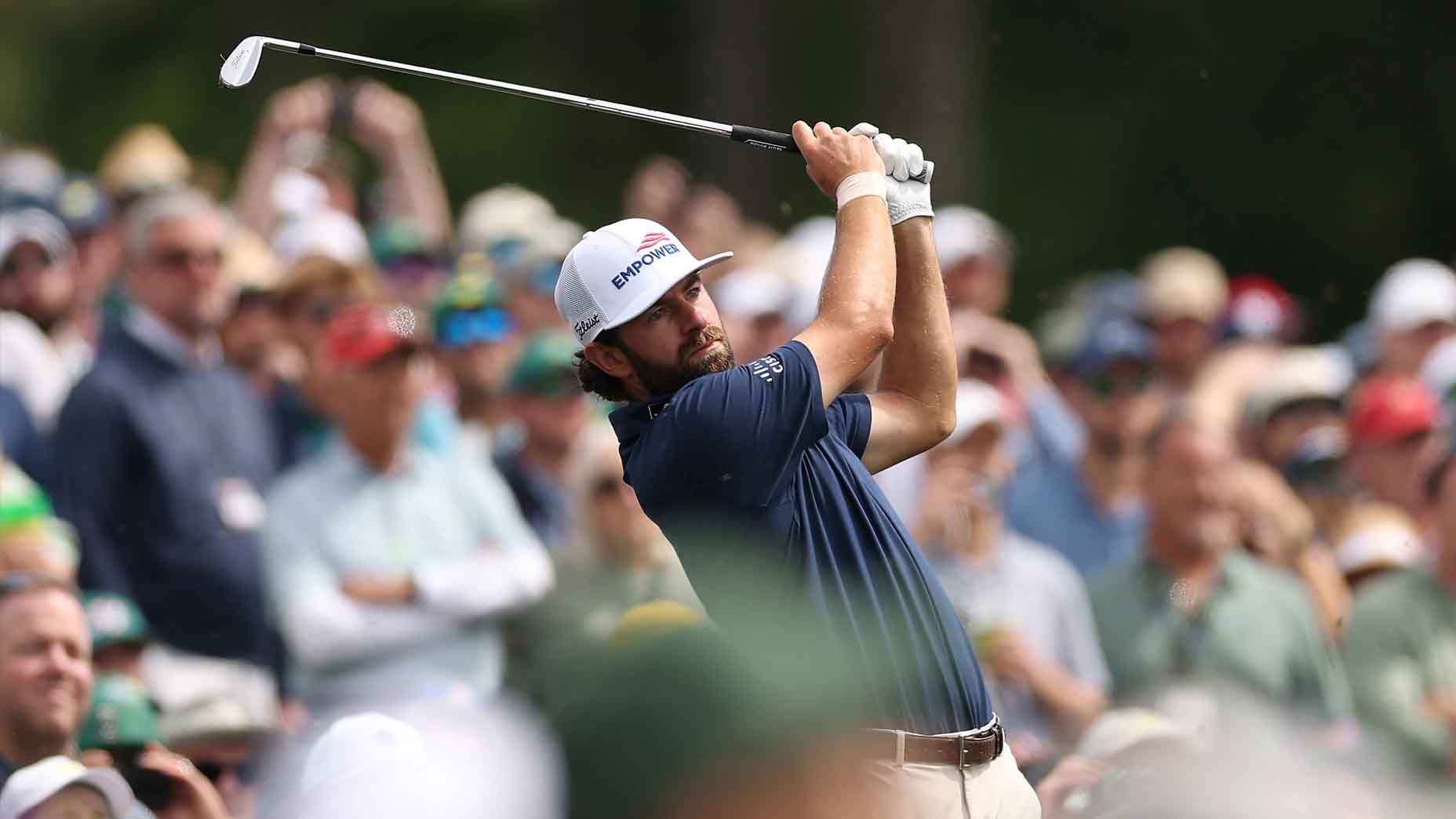 Cameron Young hits a tee shot at Augusta National