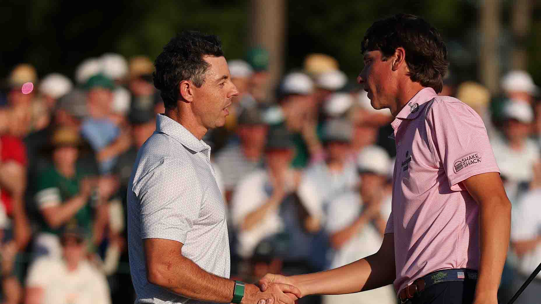 Mason Howell and Rory McIlroy shake hands