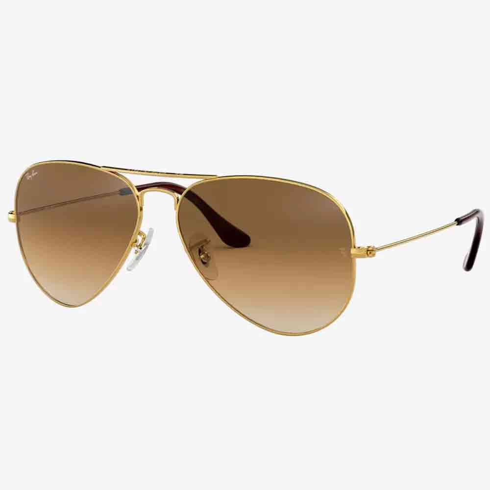 Aviator sunglasses with gold metal frames and brown gradient lenses, slim temples and clear nose pads - a stylish Mother's Day gift idea, displayed on a white background.