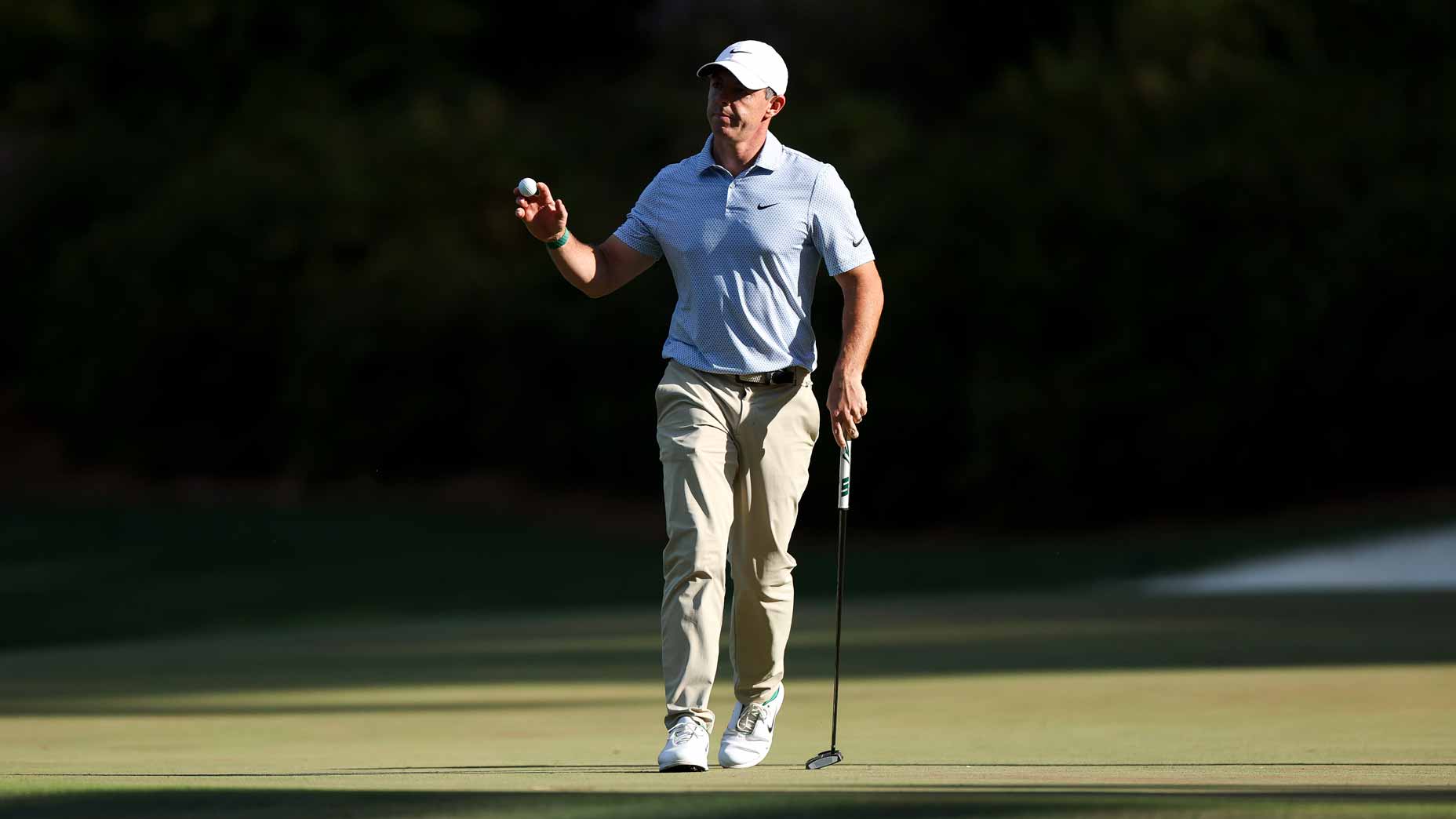 rory mcilroy waves to the crowd during the final round of the 2026 masters tournament at augusta national
