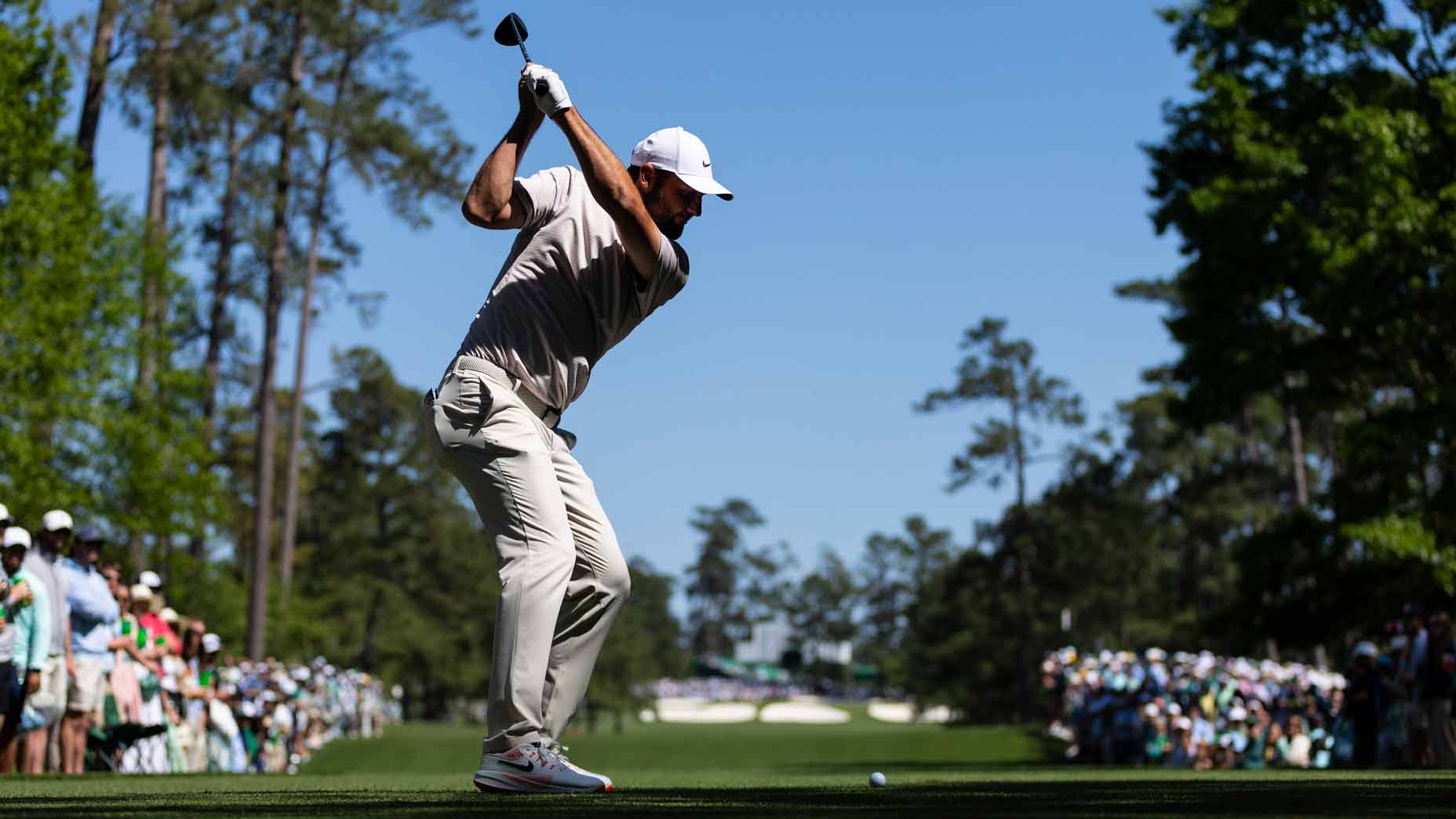 2026 Masters favorite Scottie Scheffler hits drive at Augusta National.