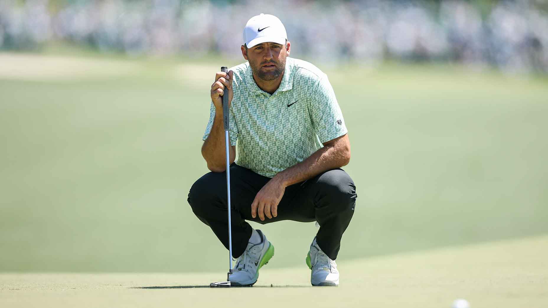 Scottie Scheffler looks on during the 2026 Masters first round.