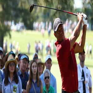 Tiger Woods hits a shot at the Masters