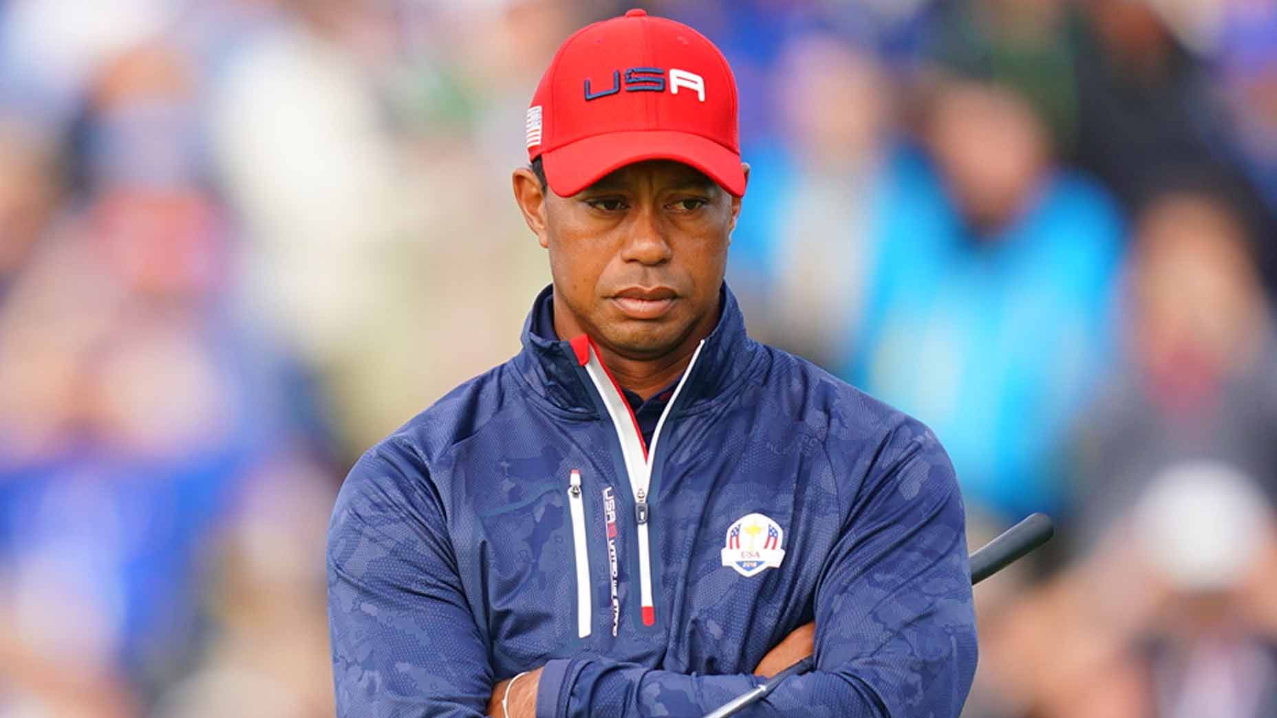 Tiger Woods crosses arms during 2018 Ryder Cup.