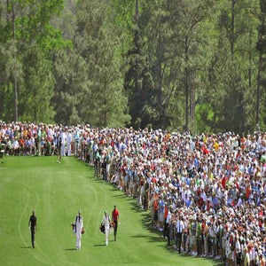 Scenic view of Tiger Woods with caddie Steve Williams and Phil Mickelson with caddie Jim Mackay walking during Sunday play at Augusta National.