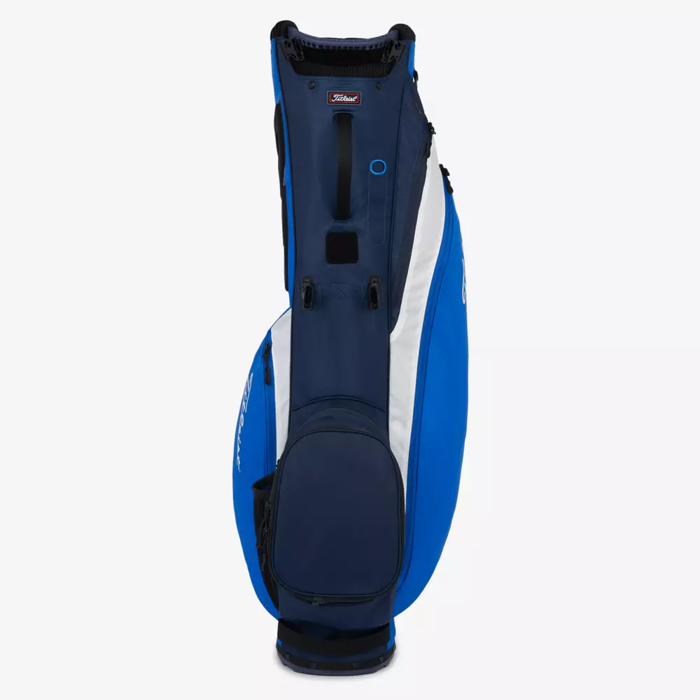 A blue, white, and navy golf bag with multiple zippered pockets and a Titleist logo at the top&mdash;one of the best golf deals for $100 or less&mdash;stands upright against a plain white background.