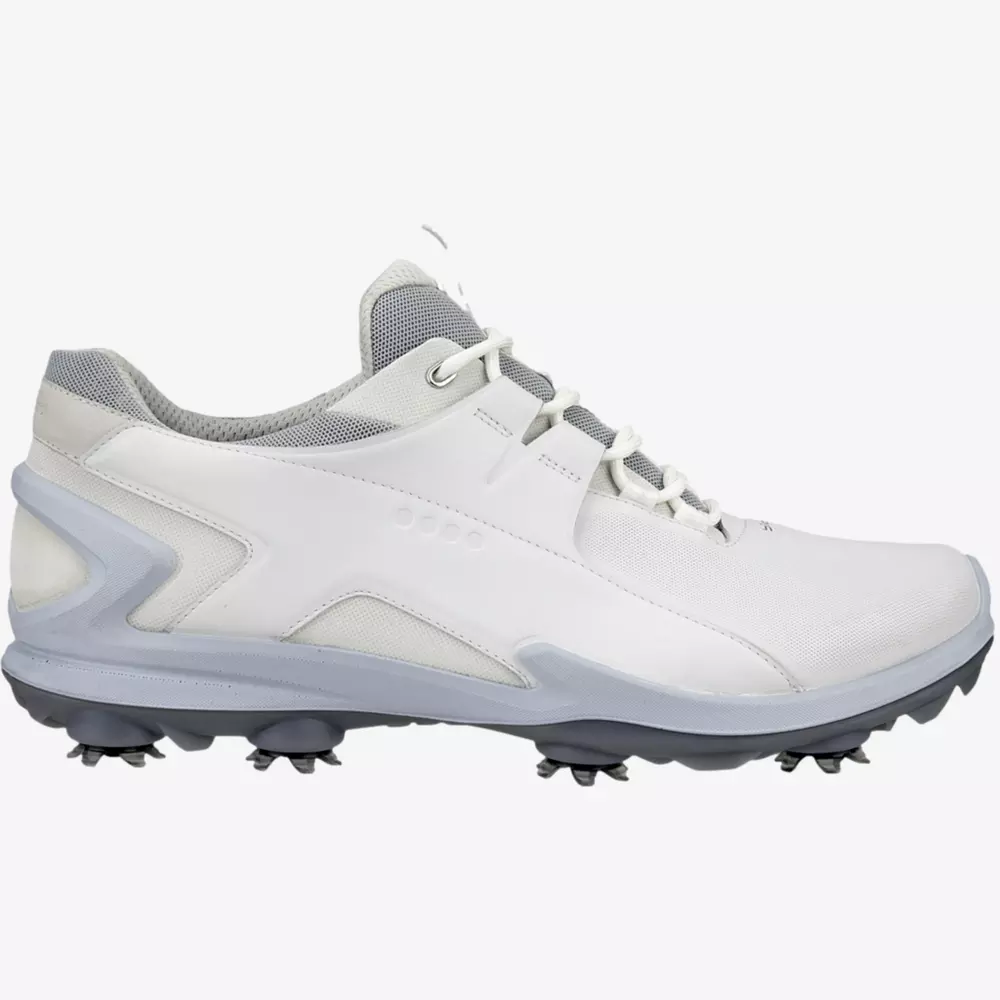 A white and light gray athletic golf shoe with a textured sole and cleats, shown from the side on a plain white background&mdash;perfect for those seeking the best golf deals for $100 or less.