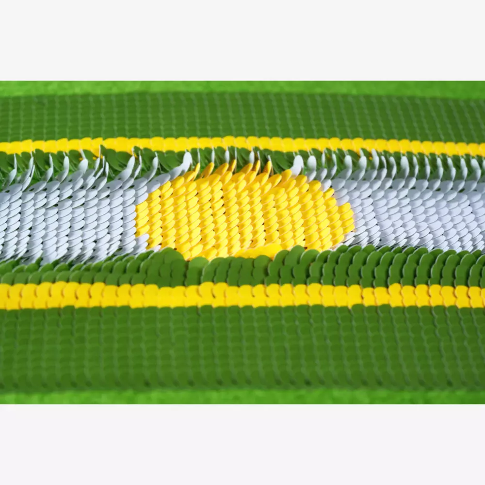 Rows of small, round sequins form a green-edged pattern with a white center and a yellow sun or circle, bordered by yellow stripes. The shimmering surface offers eye-catching style&mdash;find best deals under $50 for this vibrant look.