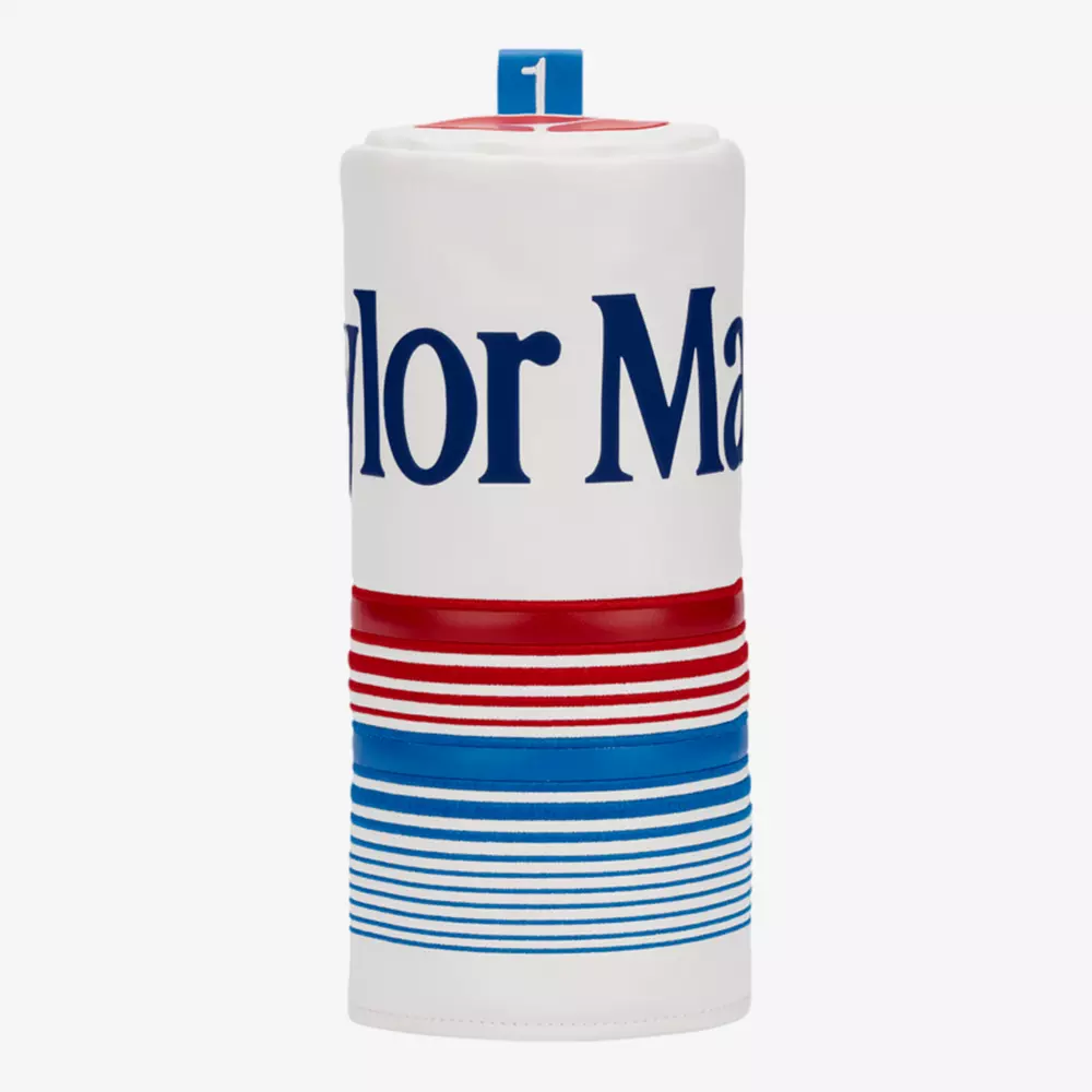 A white golf club headcover with TaylorMade partially visible in blue text, featuring horizontal red and blue stripes and a blue 1 tag on top&mdash;perfect for those seeking the best golf deals for $100 or less.