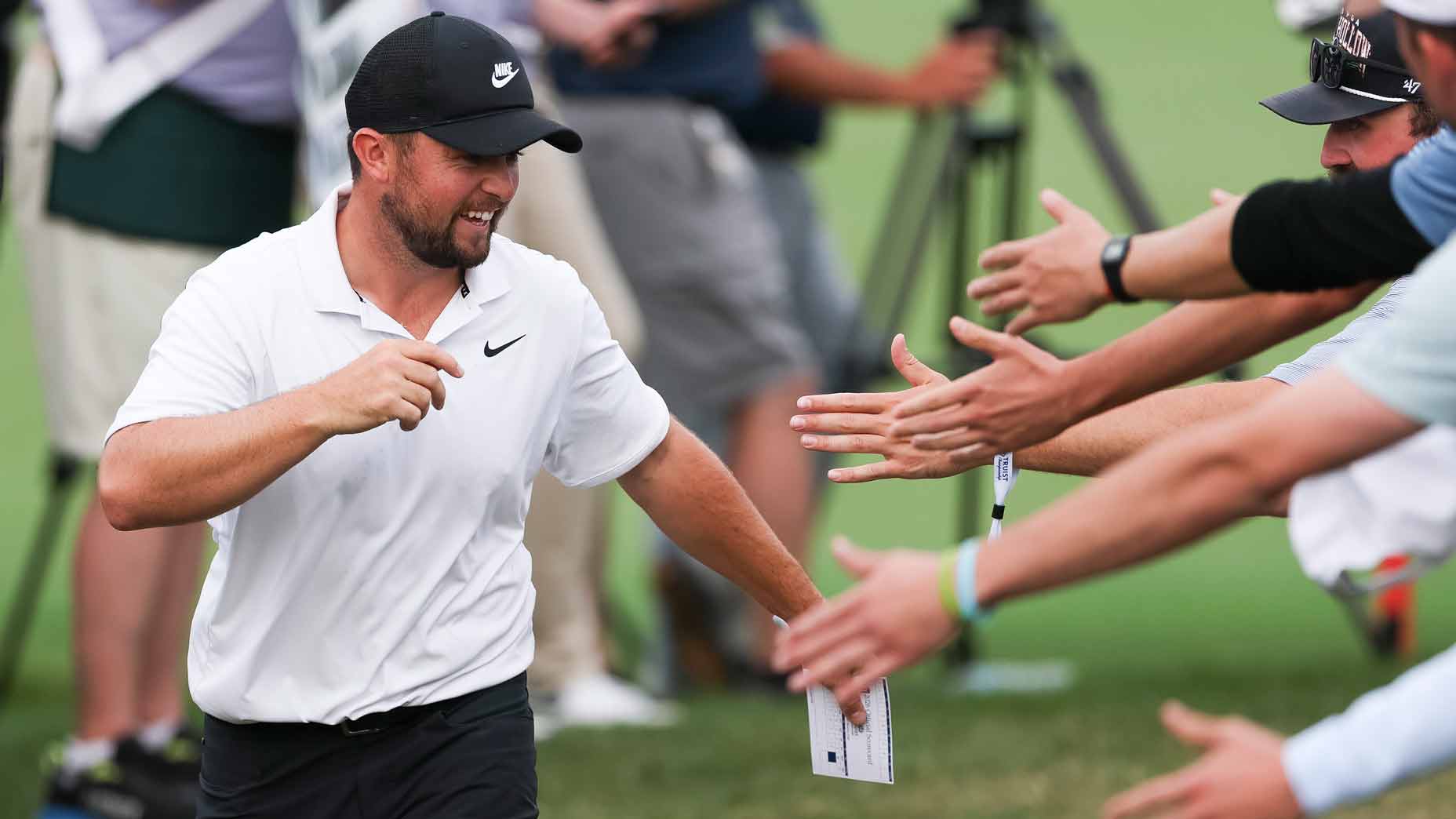 Alex Fitzpatrick of England reacts with fans as he walks to the 18th hole tee box during the third round of the Truist Championship 2026 at Quail Hollow Country Club on May 09, 2026 in Charlotte, North Carolina. (Photo by Andrew Redington/Getty Images)