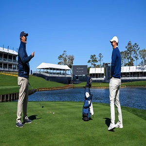Johnson Wagner stands on golf coure during CBS segment