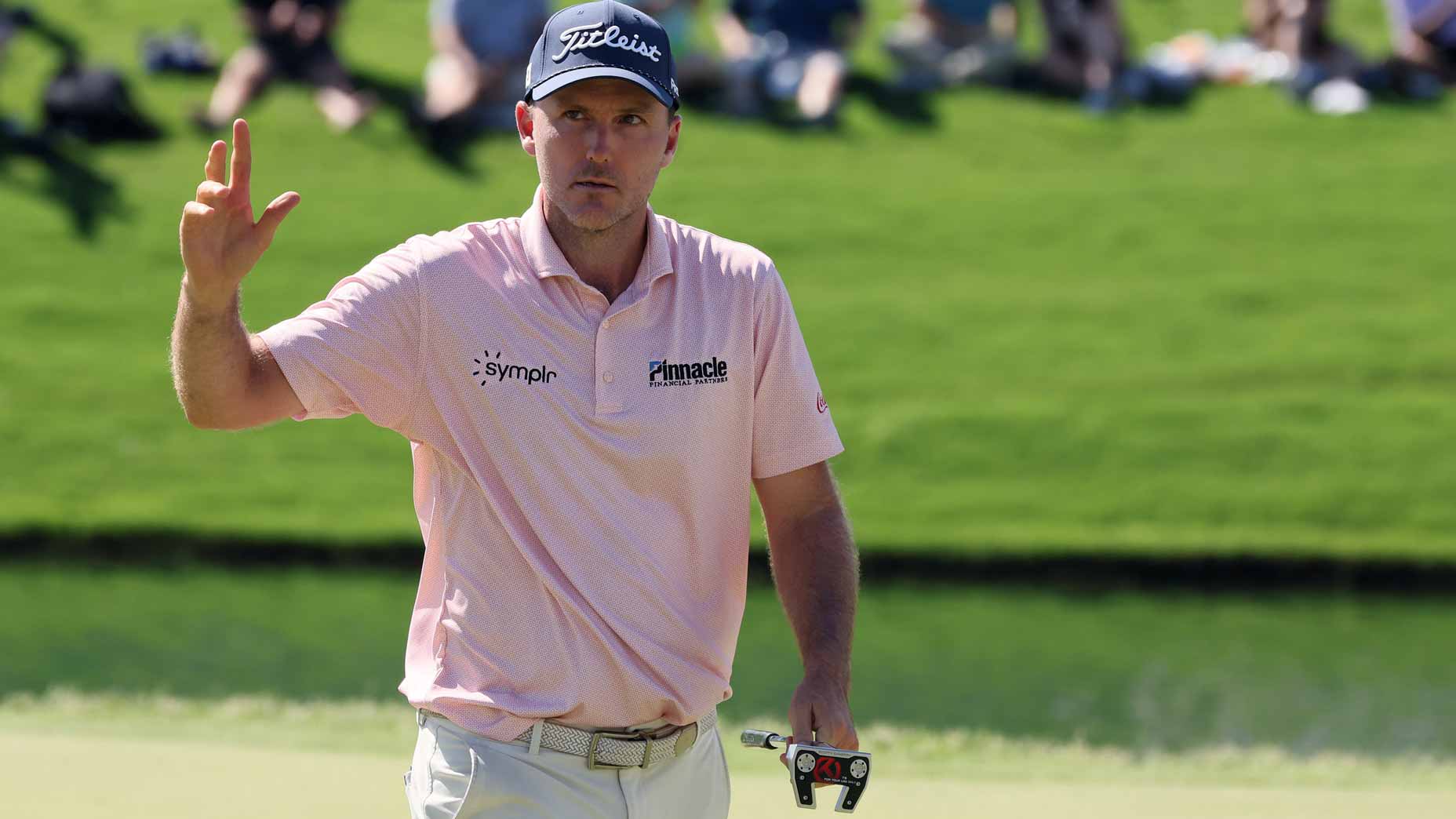 Russell Henley of the United States acknowledges the crowd on the 18th green during the final round of the Charles Schwab Challenge 2026 at Colonial Country Club on May 31, 2026 in Fort Worth, Texas. (Photo by Sam Hodde/Getty Images)