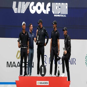 Anthony Kim and 4Aces teammates celebrate 2026 LIV Golf Virginia win on podium.