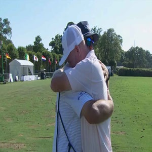 Brandt Snedeker embraces his caddie after winning the Myrtle Beach Classic