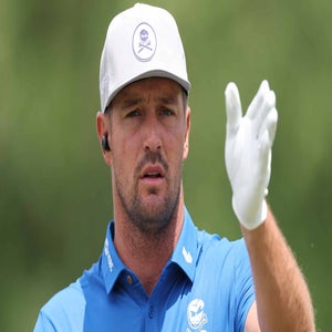Bryson DeChambeau gestures during the 2026 PGA Championship at Aronimink.