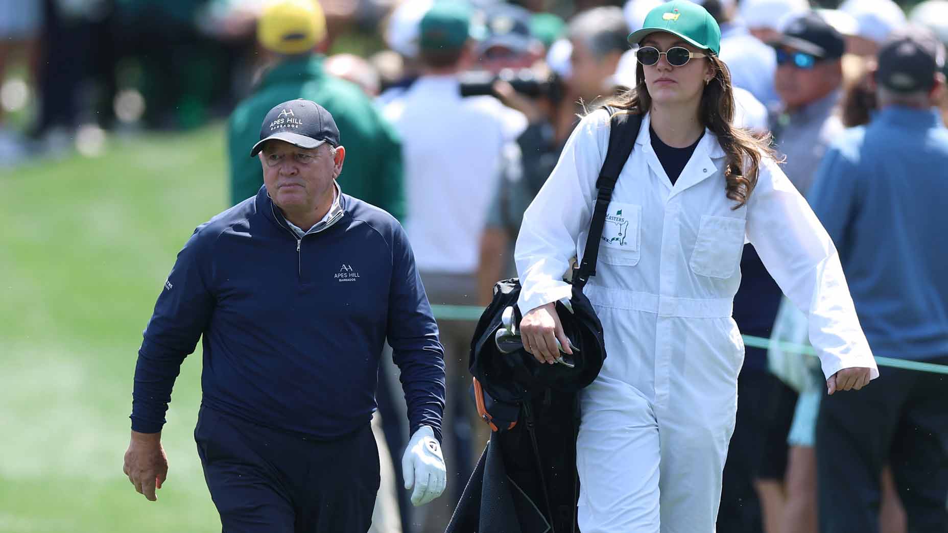 DP World Tour veteran Ian Woosnam walks with his caddie during the 2026 Masters Par 3 Contest.