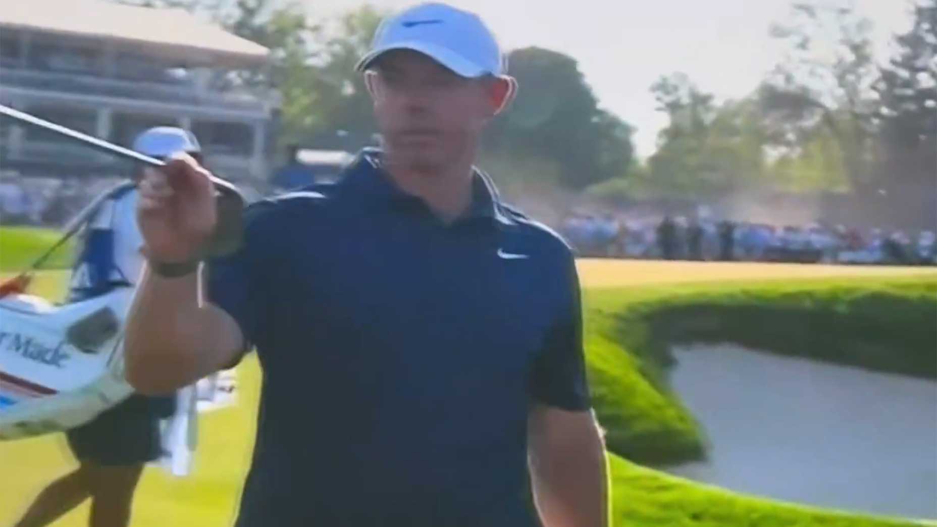 Rory McIlroy points out a fan to security during the final round of the 2026 PGA Championship on Sunday.