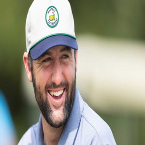 Scottie Scheffler laughs at the 2025 Masters.