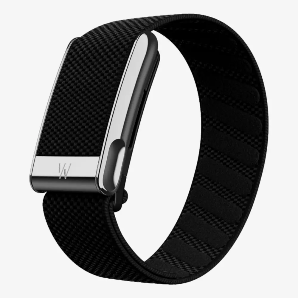 A black fabric wristband with a sleek, metallic rectangular clasp, featuring a small engraved W logo—perfect for those seeking the best deals on premium golf tech. The band has a textured surface and a modern, minimalist design.