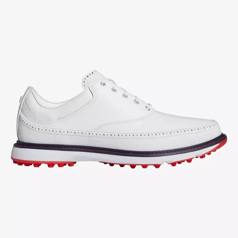 A white leather golf shoe with red spikes, white laces, and a dark blue accent stripe above the sole, shown in side profile against a plain background—an excellent pick among the best golf deals for around $250.
