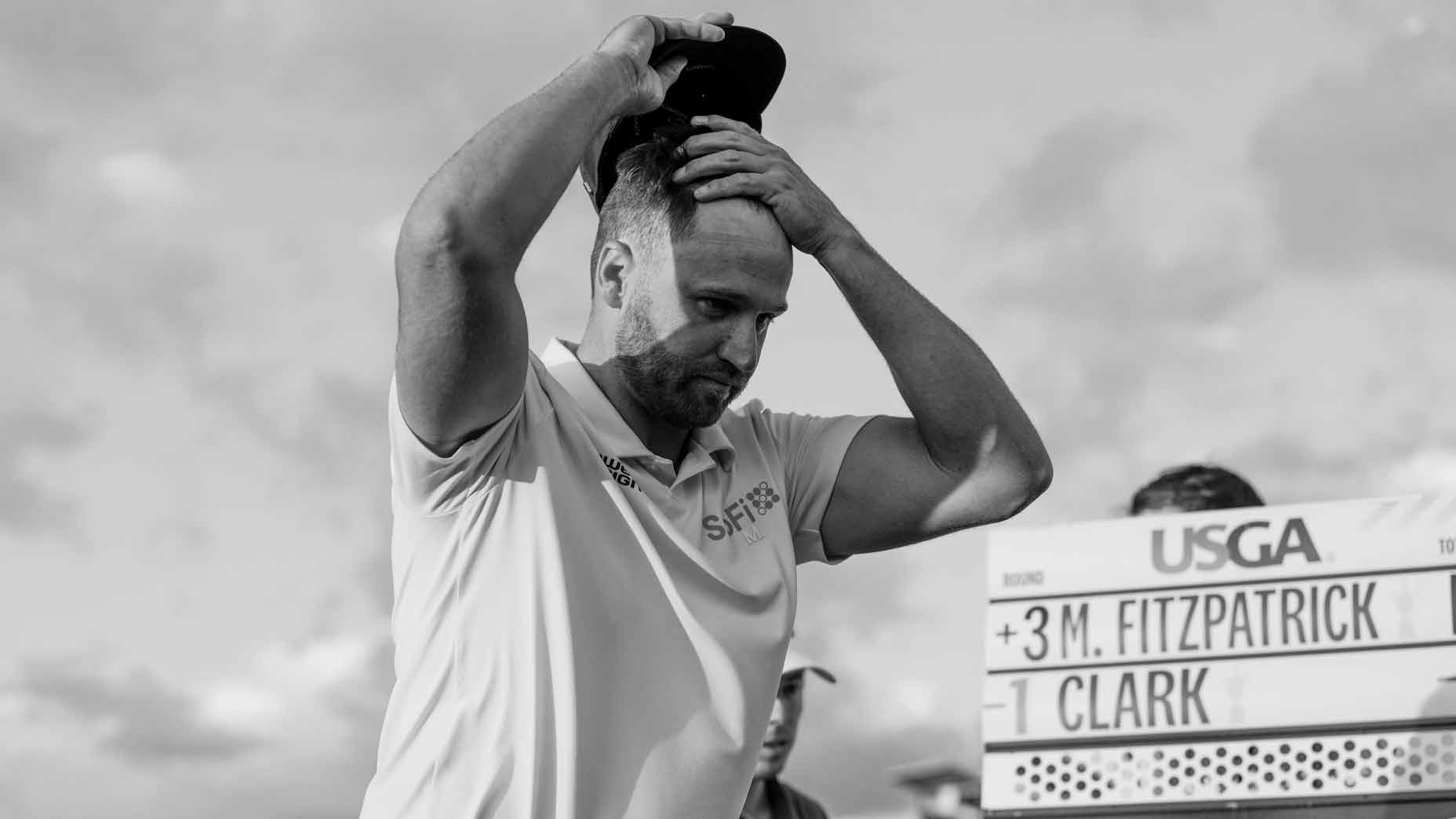 Wyndham Clark takes off hat on Saturday at 2026 U.S. Open where there was a lack of fans.