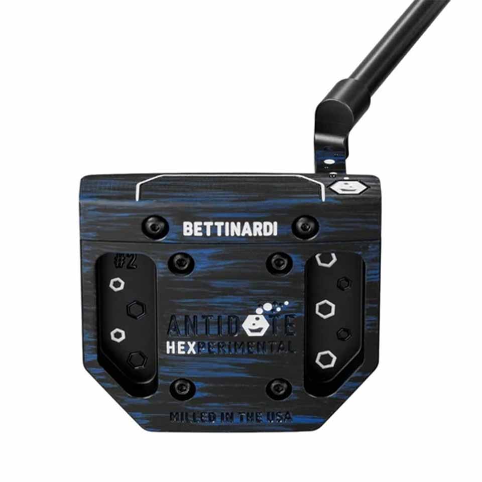 Close-up of a Bettinardi Hexperimental #2 Antidote Hex Experimental golf putter head, featuring a striking black and blue textured finish with distinctive hexagon patterns. The branding and Milled in the USA text are clearly visible on this precision-crafted putter.
