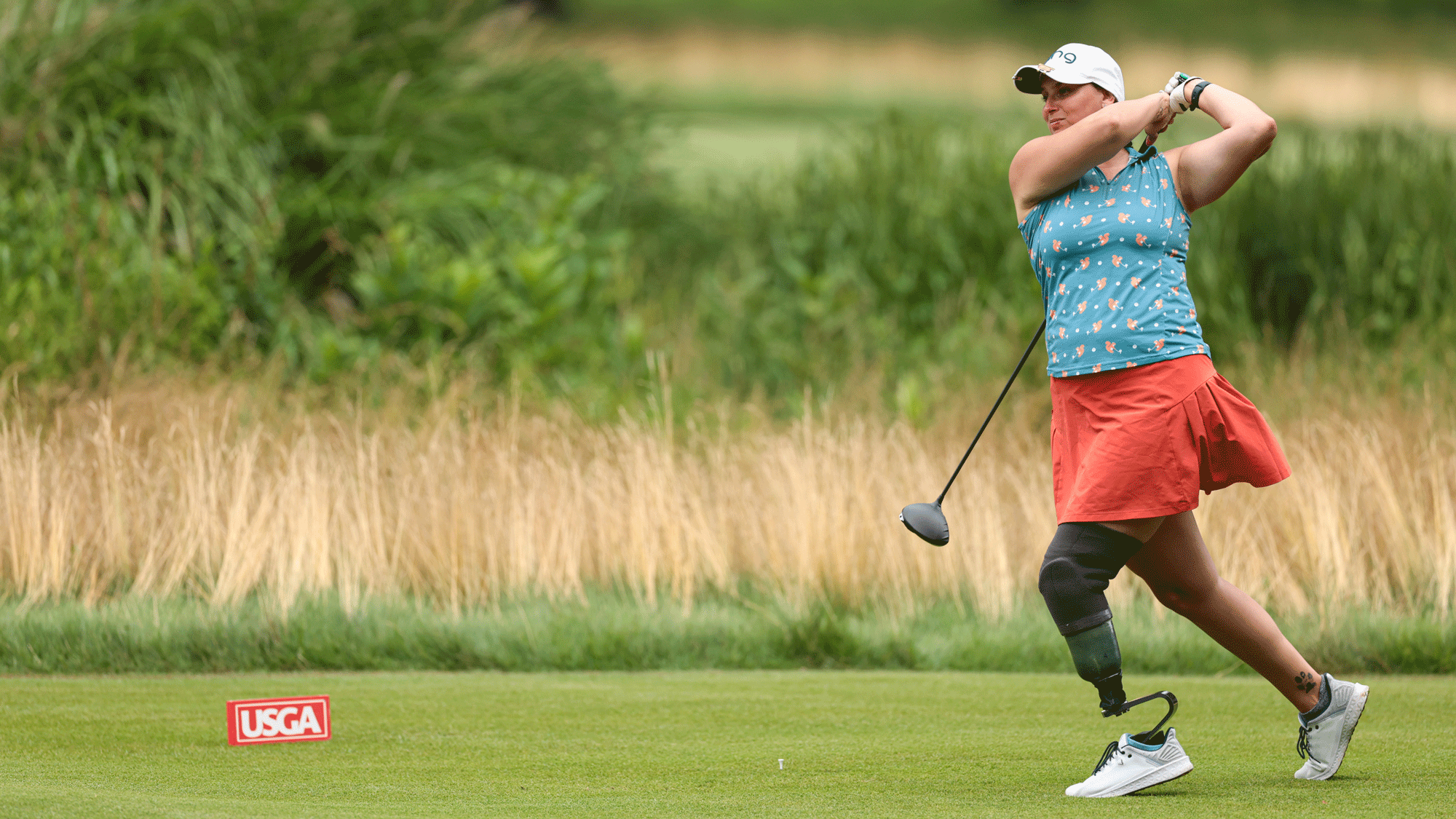 Meredith Dwyer plays her tee shot on the 16th hole during the second round of the 2026 U.S. Adaptive Open at Woodmont Country Club