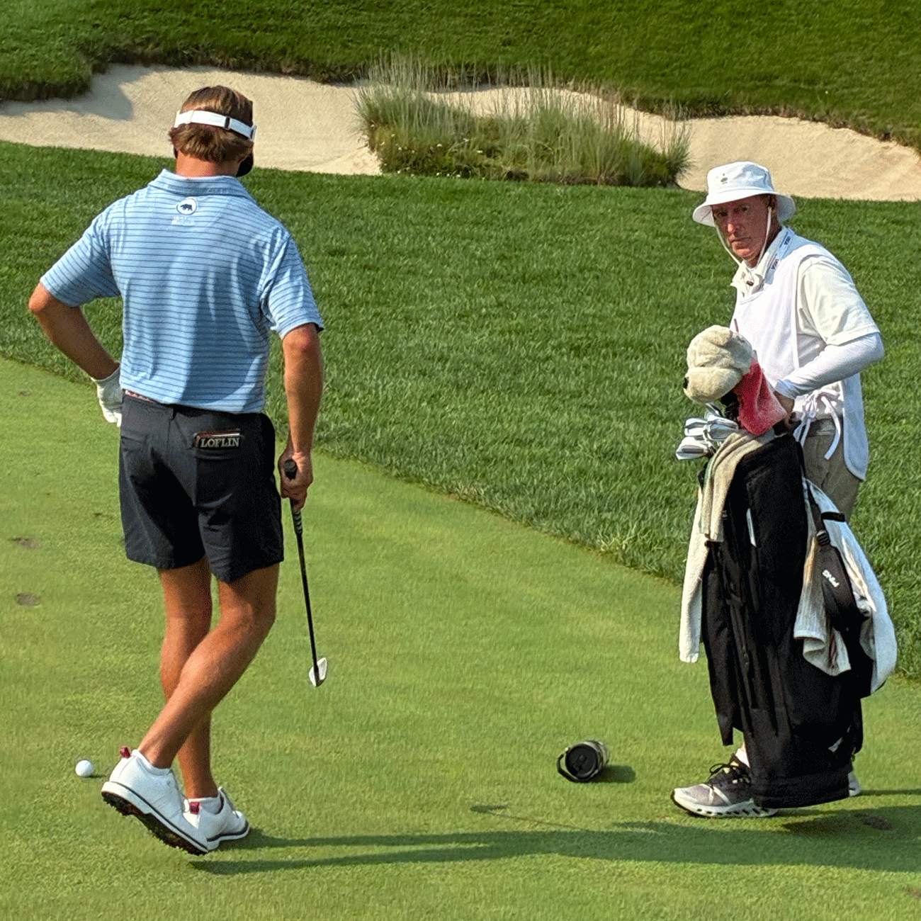 Carter Loflin with caddie Jack Hopkins at the U.S. Am
