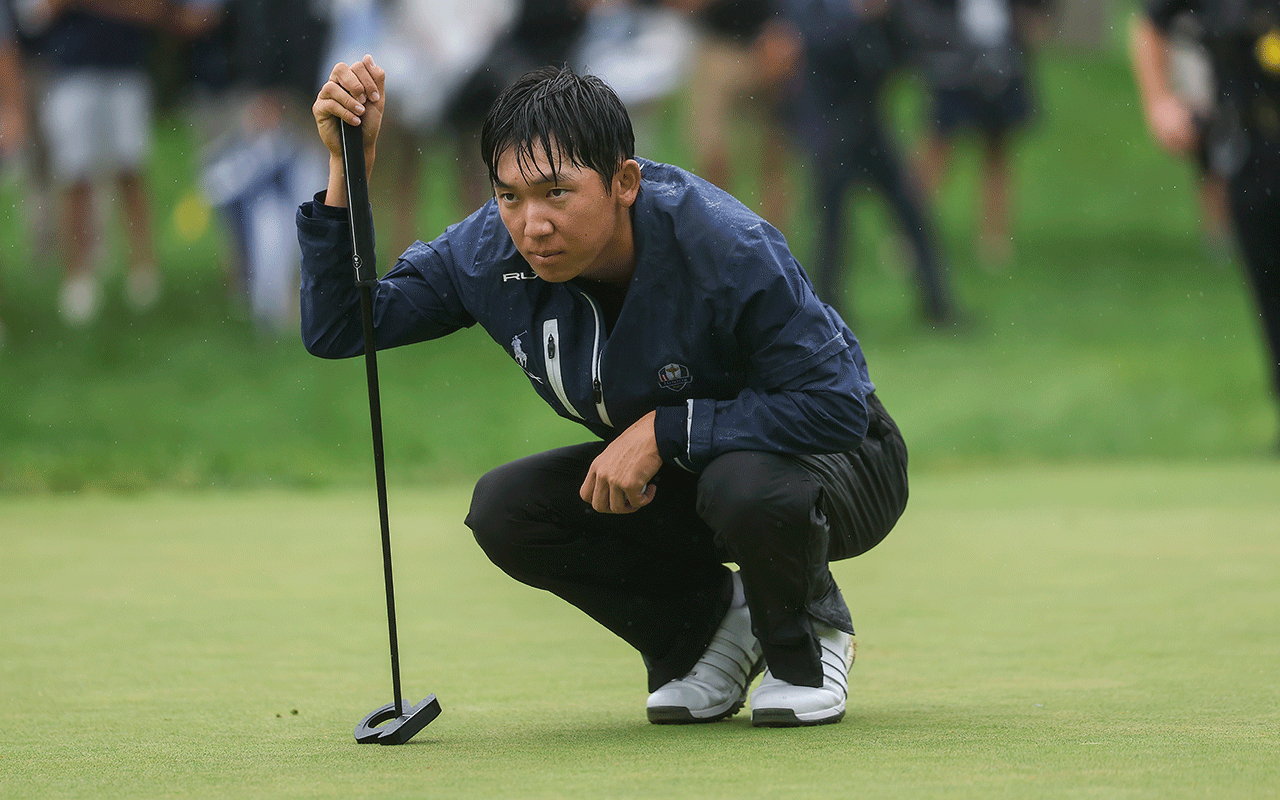 Jay Leng Jr. lines up his putt at the 33rd hole during the finals of the 2026 U.S. Amateur at Merion Golf Club